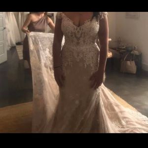 Brand new Lillian West wedding dress!  Never worn, only tried on.